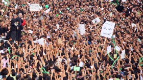 Defeated reformist presidential candidate Mir Hossein Mousavi speaks to the crowd during a demonstration in the streets on June 18, 2009 in Tehran, Iran. 
