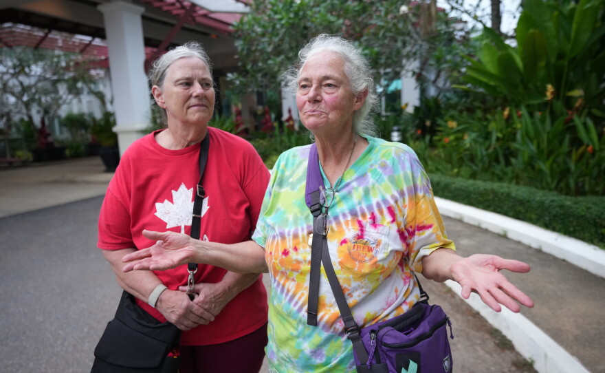 A sibling passenger from a U.S. cruise ship, the MV Odyssey, Carol Larson, 69, left, stands for an interview with her sister, Crystal Lavering, at the Independence Hotel in Sihanoukville, Cambodia, Wednesday, Oct. 28, 2026.