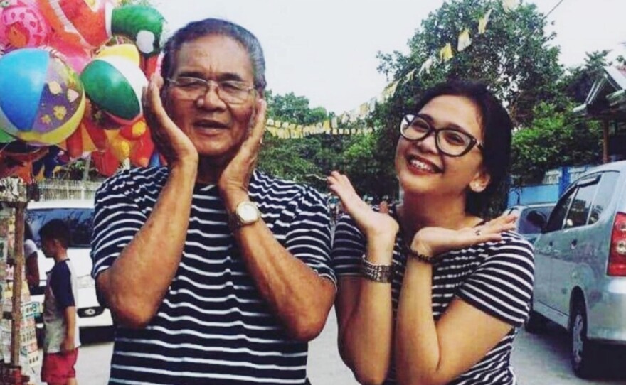 Nardo Samson posing with granddaughter Kiara Bautista, May 2017.