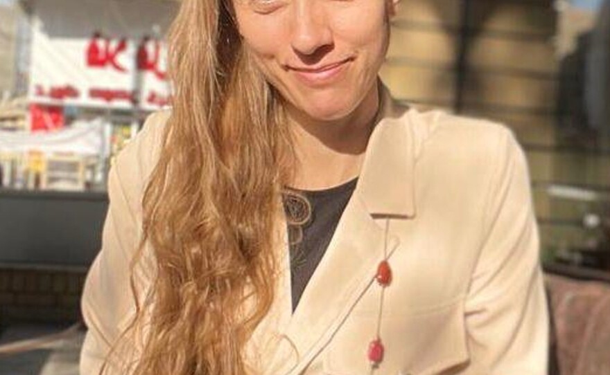 U.S. journalist Shelly Kittleson poses for a cellphone photo in a cafe in Baghdad, Iraq, March 25, 2025.