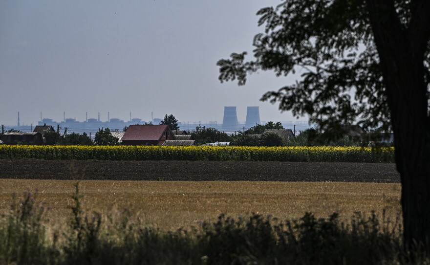 The Zaporizhzhia Nuclear Power Plant seen from Nikopol, Ukraine, on July 21. The plant and nearby areas are under threat from attacks amid Russia's invasion of Ukraine.