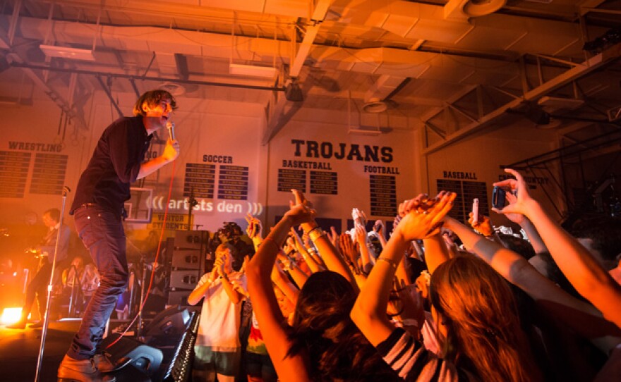 Pictured, singer Thomas Mars. Inside the Anderson High School gym in Austin, Texas, French band Phoenix blasted through a set that included such fan favorites as “Lisztomania” and “Long Distance Call” and selections from their most recent album, "Bankrupt!," before singer Thomas Mars invited the audience to join them on stage at the home of theTrojans for a thrilling, chaotic rendition of “1901.”