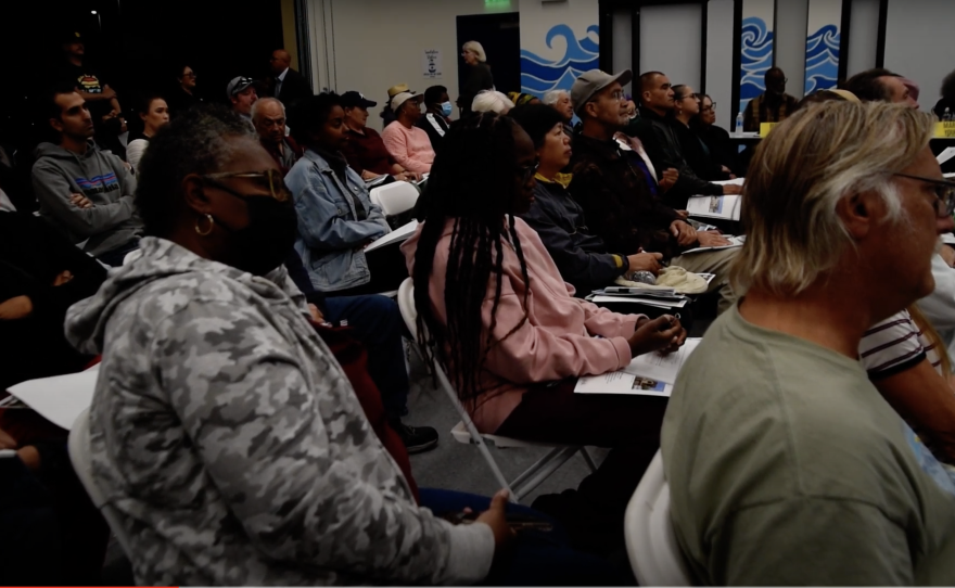 Neighbors pack a community room at KIPP Adelante Preparatory Academy for the Chollas Valley Community Planning Group Meeting on Monday, Oct. 28, 2024.