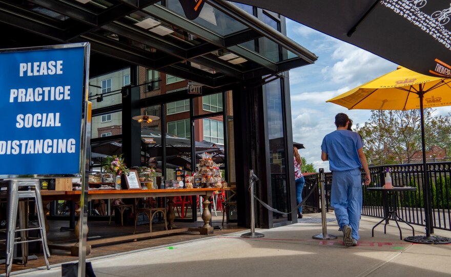 A restaurant in Ohio, Taste of Belgium, seats customers outside as businesses begin to reopen in the wake of the coronavirus pandemic on Friday.