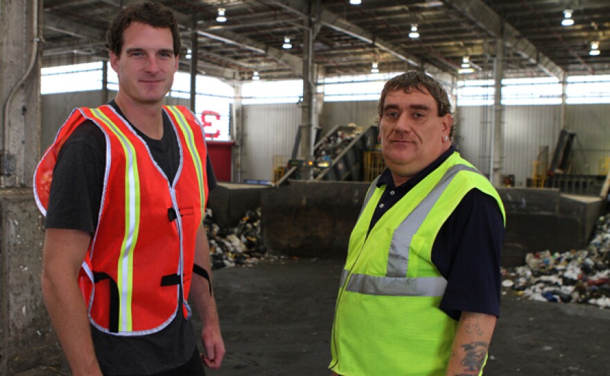 Host Dan Snow with a contributor at the Staten Island Rubbish Plant, New York City.
