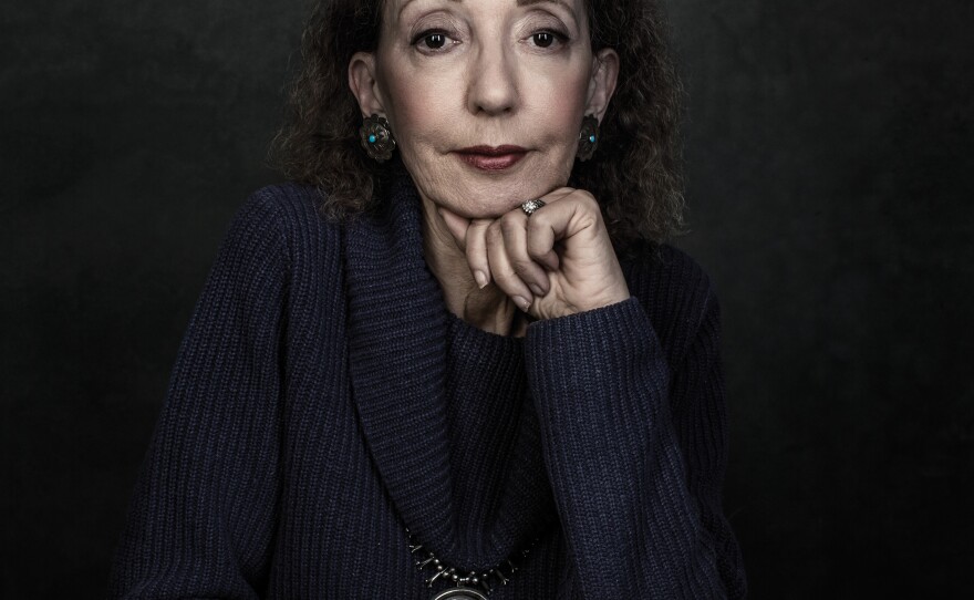 Oates has a computer, but she chooses to write everything by hand first. The desk in her study is filled with scraps of paper full of notes.