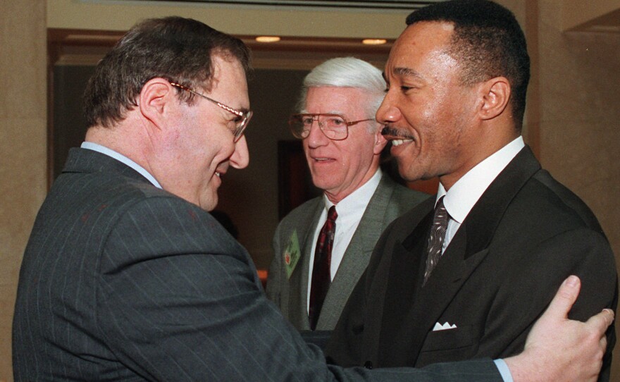 NAACP President and Chief Executive Officer Kweisi Mfume, right, embraces Anti-Defamation League National Director Abe Foxman in Washington prior to a discussion entitled "Black/Jewish Relations and the Future of the East Civil Rights Movement" on April 22, 1996. Foxman led the ADL from 1987 to 2015.