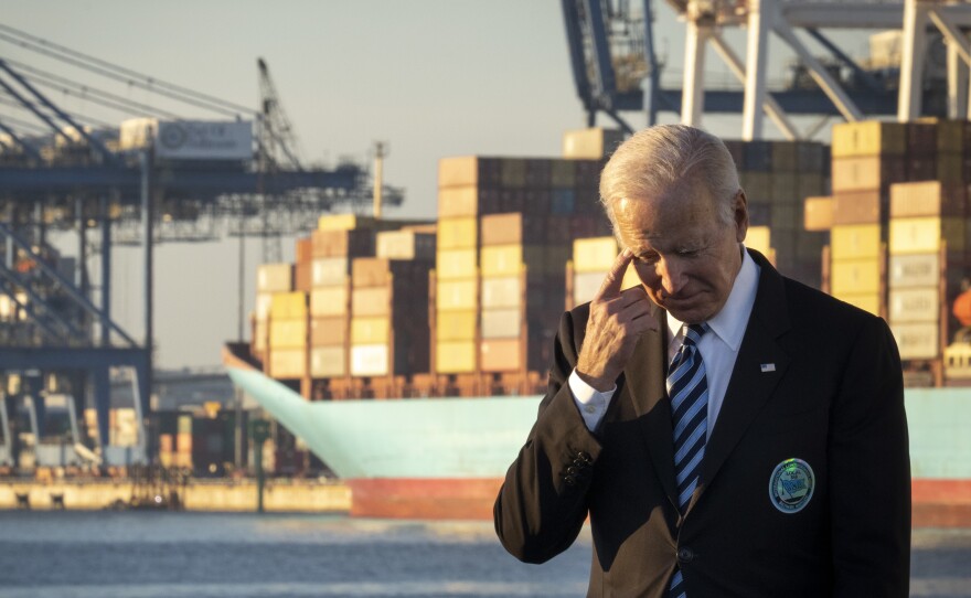 President Biden waits to speak about the recently-passed Infrastructure Investment and Jobs Act at Baltimore's port in Maryland on Nov. 10. During his speech, Biden acknowledged inflation is surging and said his infrastructure plan would help ease some of the price pressures.