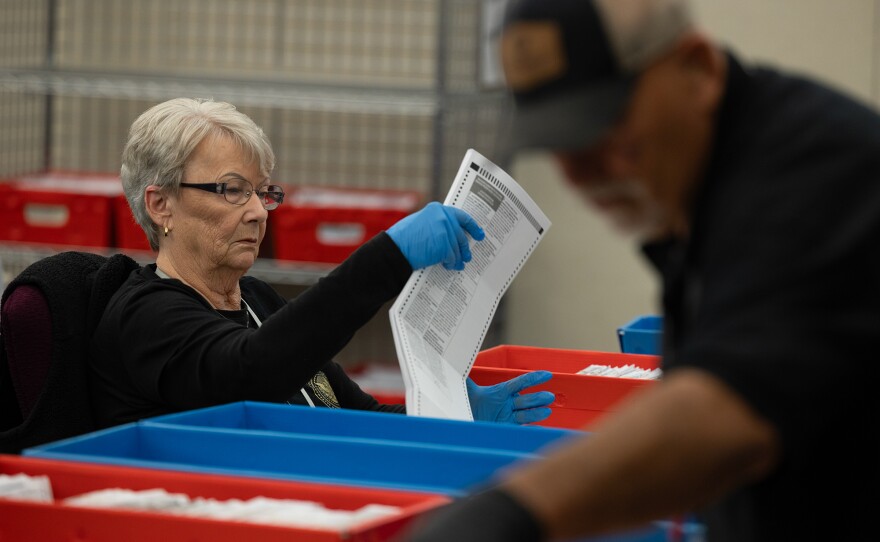 Election workers process ballots at the Sacramento County Voter Registration and Elections office in Sacramento on Nov. 5, 2024.