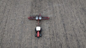 In this aerial view, Dan Duffy uses a tractor to plant soybeans on land he farms with his brother on April 28, 2025 near Dwight, Illinois.