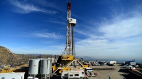Crews work on stopping a gas leak at a relief well at the Aliso Canyon facility above the Porter Ranch area of Los Angeles, Dec. 9, 2015.