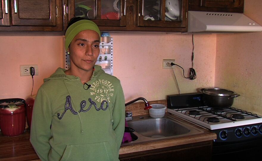 Ruth Betancourt bought a house with her husband in Villa del Prado eight years ago. She's watched the neighborhood deteriorate as people abandon their homes and crime rises.