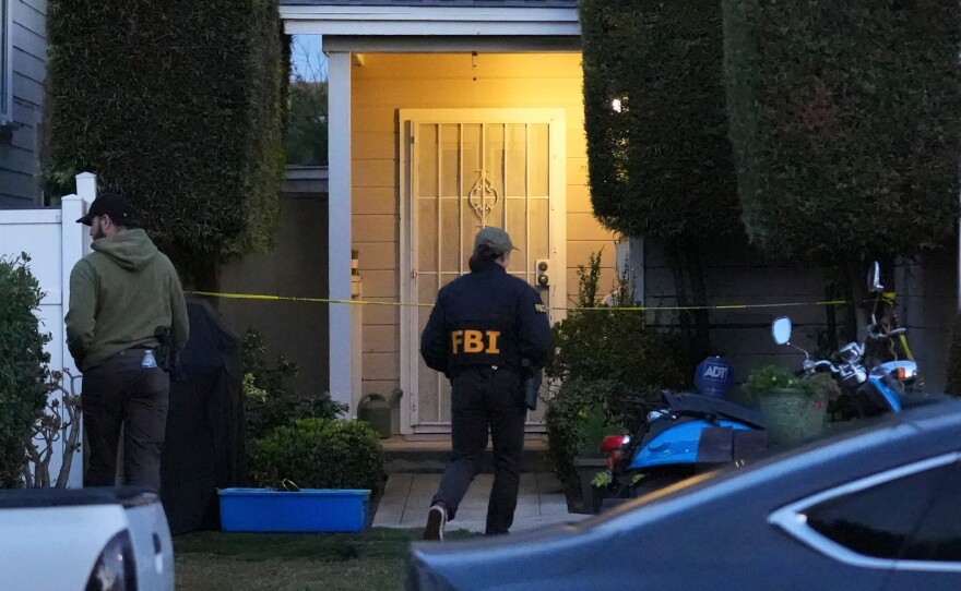 FBI agents work on Sunday at an address in Torrance, Calif., connected to Cole Tomas Allen, who was identified as the shooting suspect at the White House Correspondents Dinner the night before.
