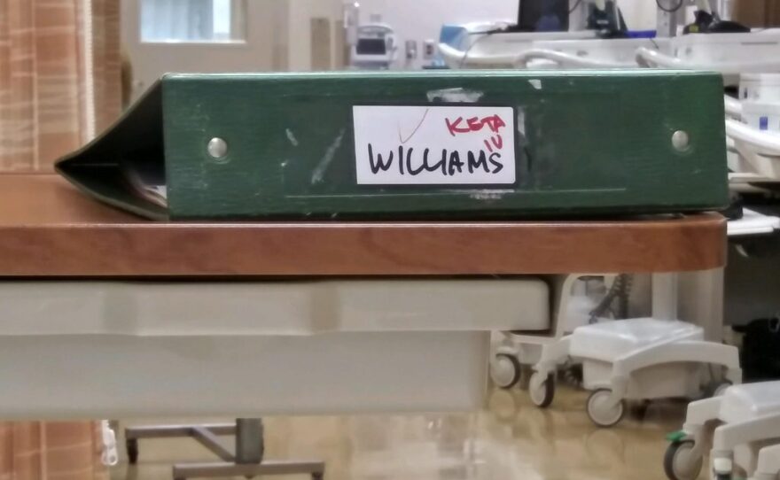 A binder with medical records for AJ Williams' IV ketamine treatments at the San Diego VA Medical Center in La Jolla is shown on Aug. 11, 2020.