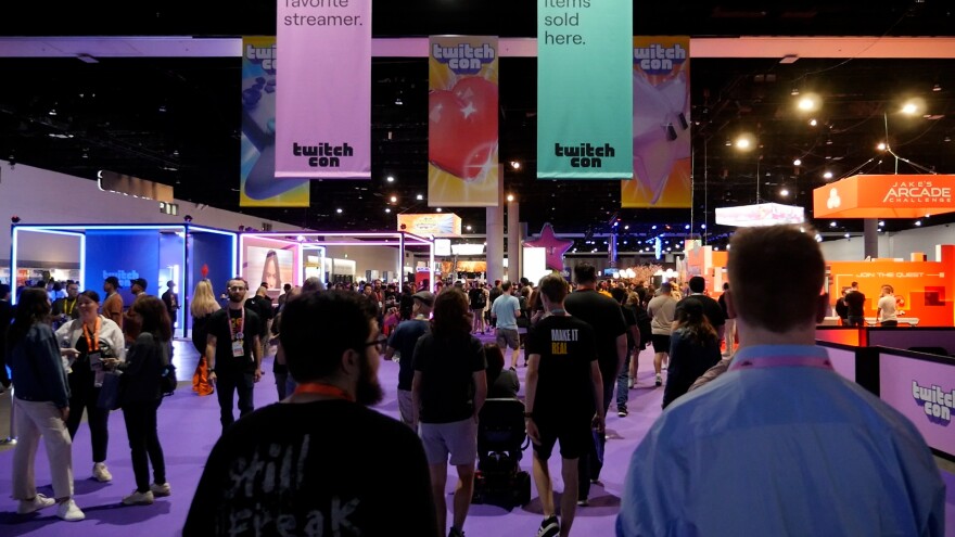 TwitchCon attendees walk through the convention floor on Sept. 20, 2024 at the San Diego Convention Center.