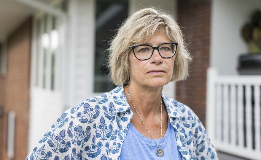Maria Ruhtenberg, an attorney with the Iowa Office of the State Public Defender, has settled with the state after she was fired and later reinstated following online comments she made about the shooting death of conservative activist Charlie Kirk.