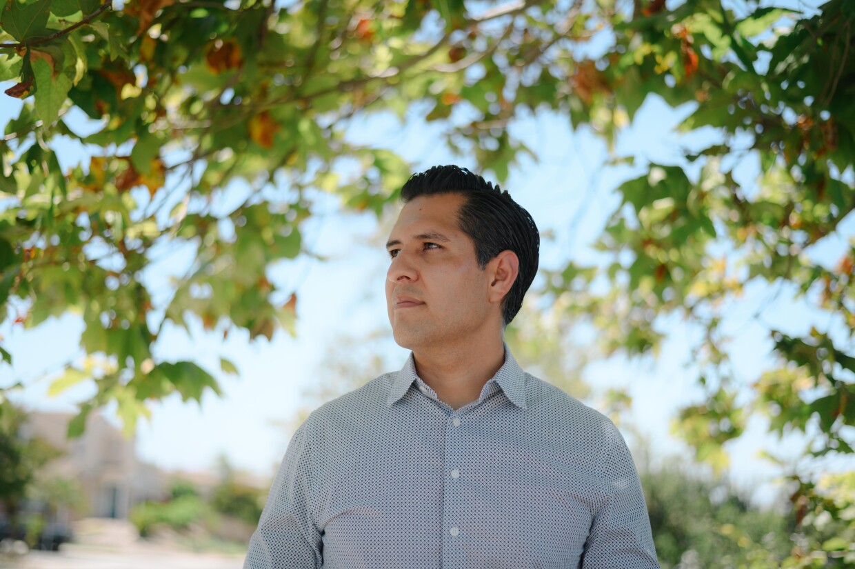 Chula Vista resident Juan Escorcia stands for a portrait in the San Miguel neighborhood, where he lives, on June 25, 2024. Escorcia works as a real estate agent in Chula Vista and thinks residents should be more involved in preparing for wildfires.