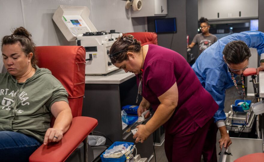 Blood bank technologists on May 25 prepare during an emergency blood drive for victims of the Uvalde school shooting.