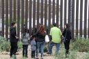 Undated photo of families between the U.S. and Mexico border is captured above. In 2011 Border Patrol partially reopened Friendship Park, allowing up to 25 people at a time to visit with friends and families across the international boundary. This vision of friendship between the people of both nations will be extinguished with the closure of Friendship Park.