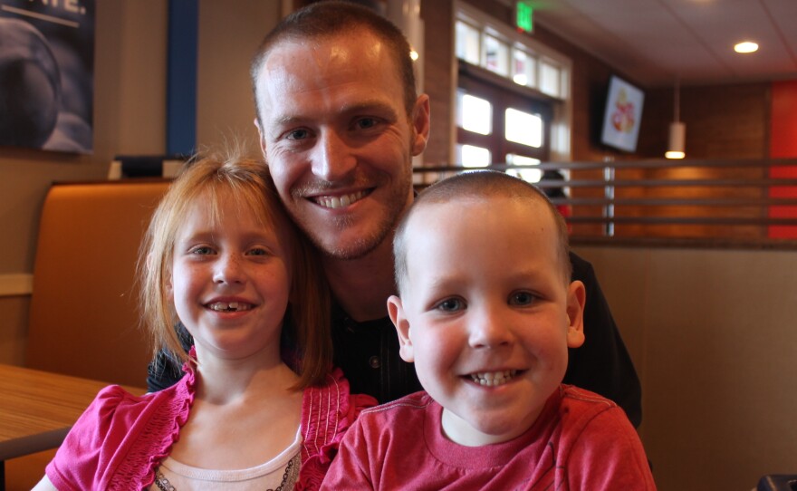 Todd Unsicker-Montoya, with his children, Janice and Trevor Unsicker.
