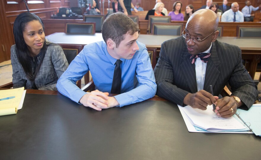 The defendant, Jimmy Moran, and his defense team, spearheaded by attorney Tony Ricco.