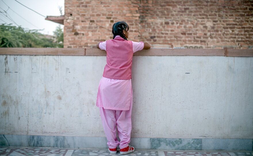 Nimmu on the terrace of the Veerni Institute. She's not looking to get out of her arranged marriage, but she does want to graduate school and get a job first. That way, she says, her in-laws won't be able to boss her around.