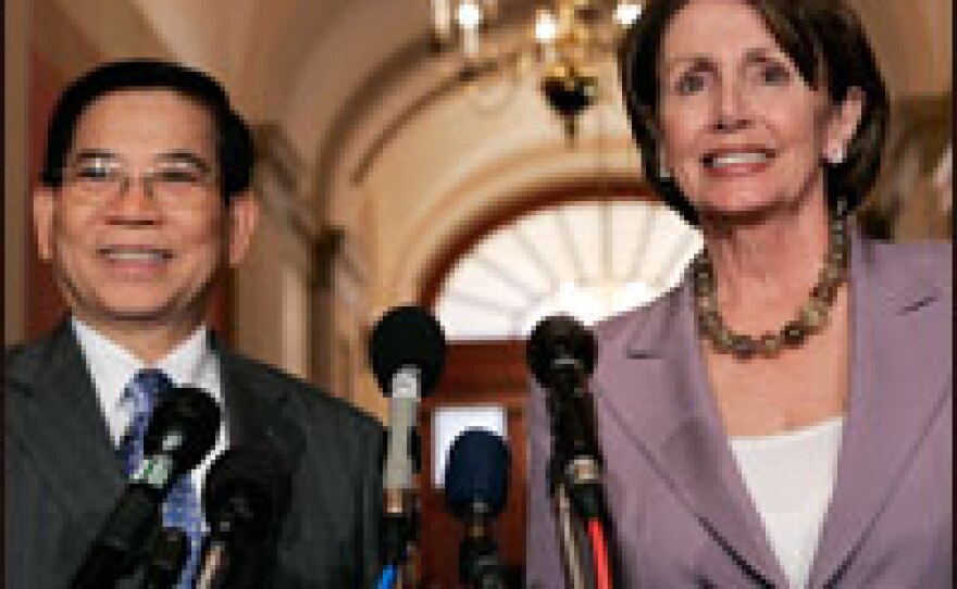 House Speaker Nancy Pelosi (D-CA) and Vietnamese President Nguyen Minh Triet speak to reporters before a meeting at the U.S. Capitol June 21, 2007.