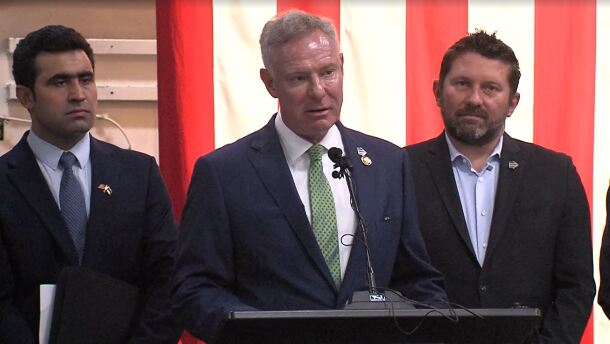 U.S. Representative Scott Peters (D-San Diego) speaks at a podium, Aug. 27, 2025.