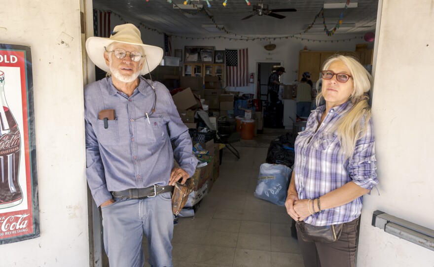 Sam Schultz and his wife, Gabrielle, from the mutual aid group Border Kindness, have been feeding and clothing migrants waiting in the desert near Jacumba Hot Springs, for immigration processing, October 6, 2023.<br/>