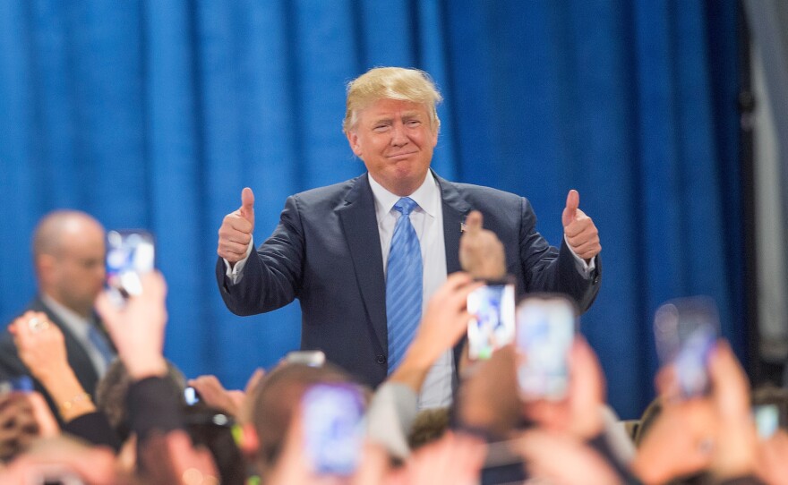 Trump greets his supporters at a December 5 rally in Davenport, Iowa.
