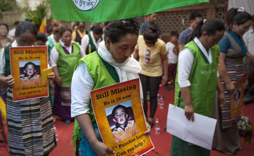 Members of Exile Tibetan Women Association protest to demand the immediate release of Gedhun Choekyi Nyima, the 11th Panchen Lama, during a gathering to mark the 20th anniversary of his disappearance, in New Delhi, India, on Sunday.