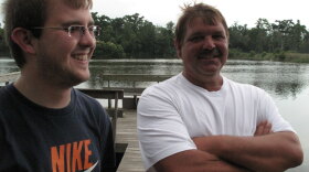 Erwin "Bubba" Menesses Jr. (right) worries that his son Trey won't have a business to take over. The family has been making nets by this dock in St. Bernard Parish, La., for 200 years. But the oil disaster has cut business by 95 percent.