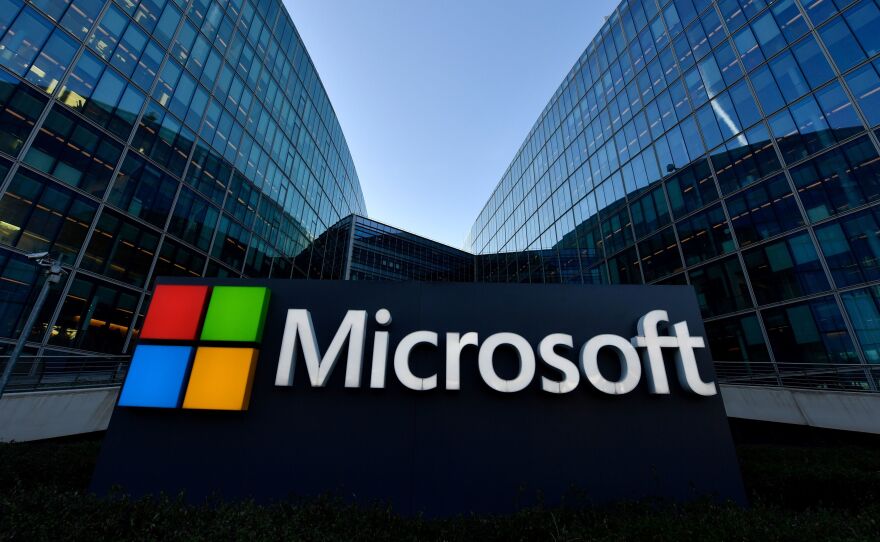 The logo of French headquarters of American multinational technology company Microsoft, is pictured outside in 2018 in Issy-Les-Moulineaux, a Paris suburb.