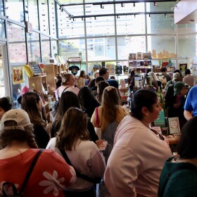 Book Crawl goers inside Library Bookshop SD during the San Diego Book Crawl, April 2025.