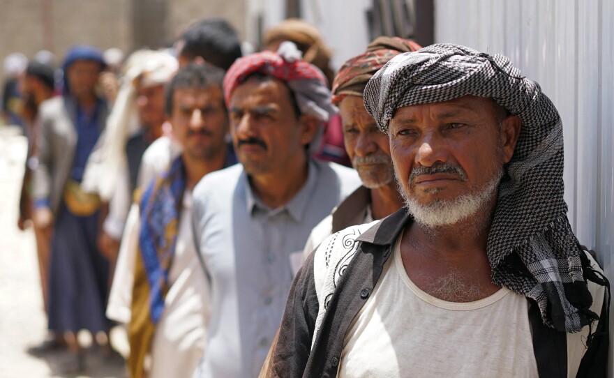 Yemenis queue up to receive a dose of the AstraZeneca COVID-19 vaccine at a center on the outskirts of Yemen's embattled province of Marib. Yemen is one of 36 countries with a vaccination rate below 10%.