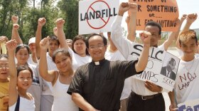 Mimi C. Nguyen (far left), Father Luke Nguyen (center) and Versailles youth celebrate victory at the Chef Menteur Landfill protest, 2006.