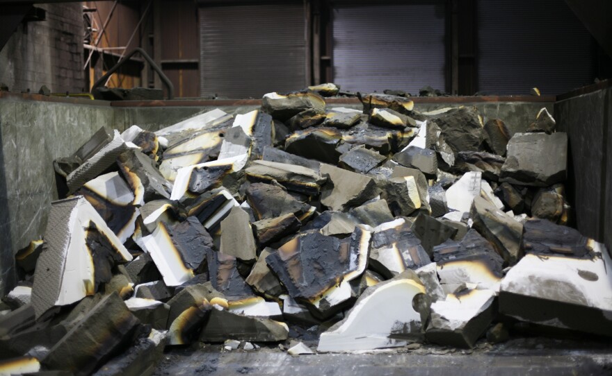 Chemically treated molding sand is broken up after the pouring and cooling process. The sand will be crushed and reused.