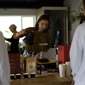 A barista makes a cup of coffee during a training session in Encuentro Cafe in this undated photo.