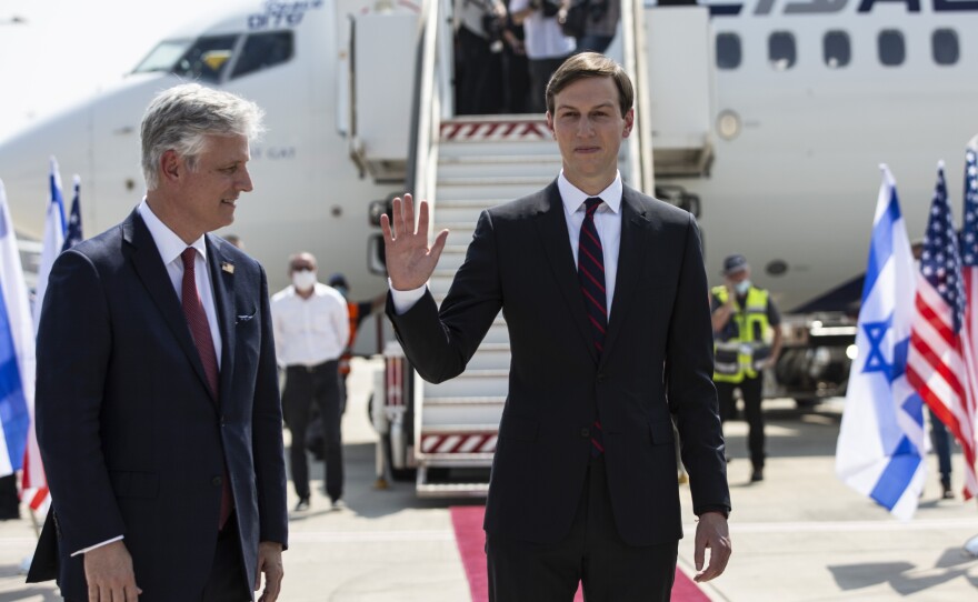 In this 2020 file photo, Jared Kushner waves as former President Donald Trump's national security adviser Robert O'Brien looks on, before their departure to Abu Dhabi from Tel Aviv.