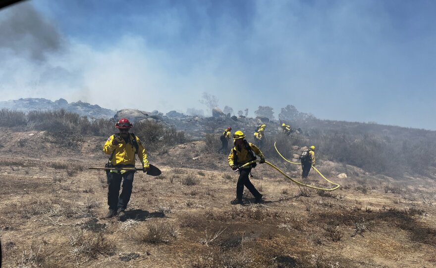 Firefighters battling the Caesar Fire in Ramona, Sept. 5, 2022.