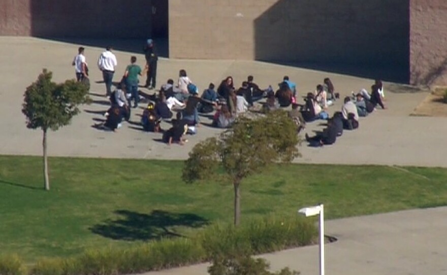 San Ysidro High School students outside the school after being evacuated due to a phone threat, Jan. 14, 2015.