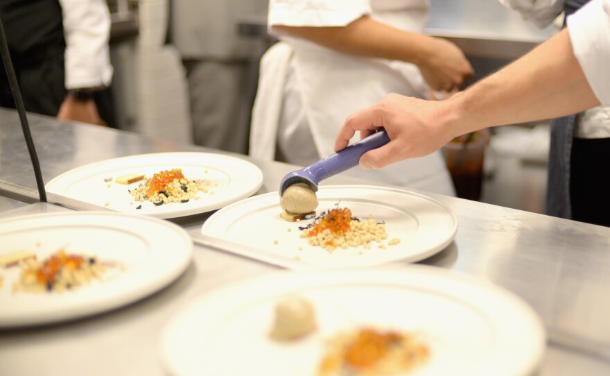 Chefs prepare food at Mexico's Dinner With Enrique Olvera And Jordi Roca during Food Network & Cooking Channel New York City Wine & Food Festival presented By FOOD & WINE at Cosme NYC on October 15, 2015 in New York City. Cosme is one of six U.S. honorees on the 2021 list of the world's 50 best restaurants.