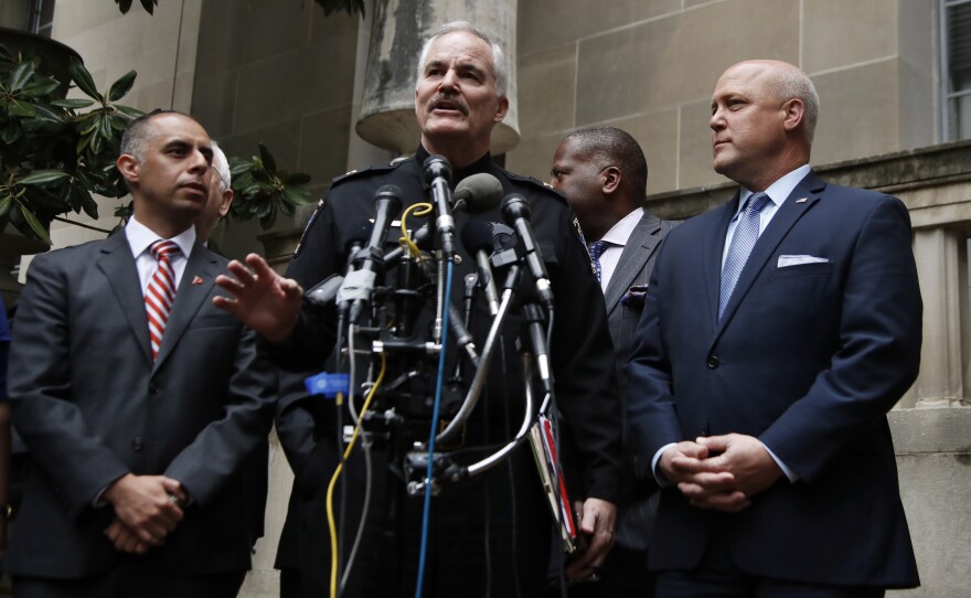 Major Cities Chiefs Association President and Montgomery County, Md., Police Chief Tom Manger, center, with Providence, R.I. Mayor Jorge Elorza, and New Orleans, La. Mayor Mitch Landrieu, right, participate in a news conference outside the Justice Department in Washington following a meeting with Attorney General Jeff Sessions, Tuesday, April 25, 2017.
