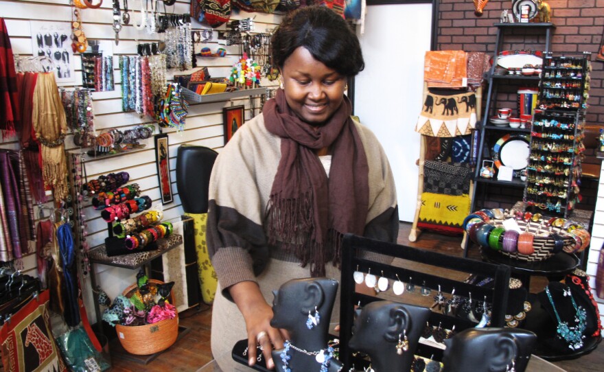 Louise Sano sells jewelry, clothing and gifts at her boutique, Global Villages, on Buffalo's west side. "It's very easy to integrate as a new American, a new person coming to the U.S. So I feel like I have created my own village," she says.