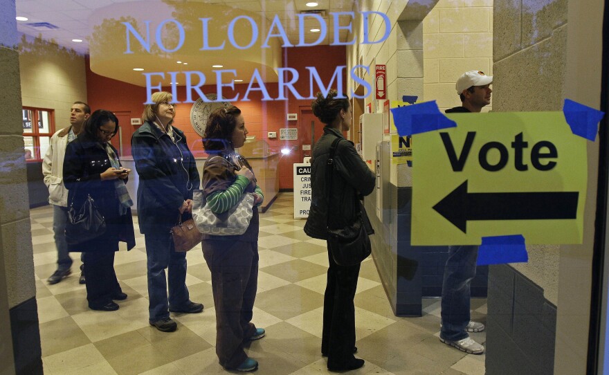 People stood in line to vote on Election Day 2012 at the Wake County Firearms Education and Training Center in Apex, N.C.