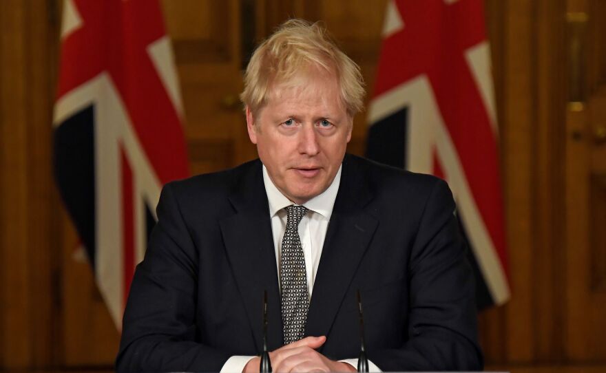 Prime Minister Boris Johnson speaks during a virtual press conference at 10 Downing Street in London Saturday to announce new lockdown restrictions in an effort to curb rising infections of the novel coronavirus.