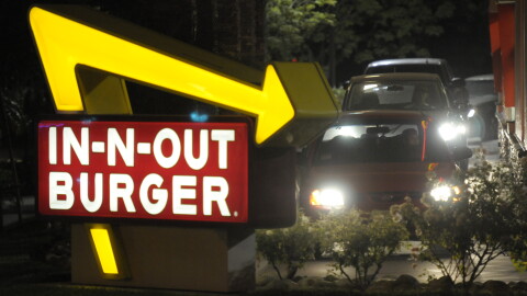 FILE PHOTO: Cars line up in the drive-thru at In-N-Out Burger on Tuesday, June 8, 2010, in Baldwin Park, Calif.