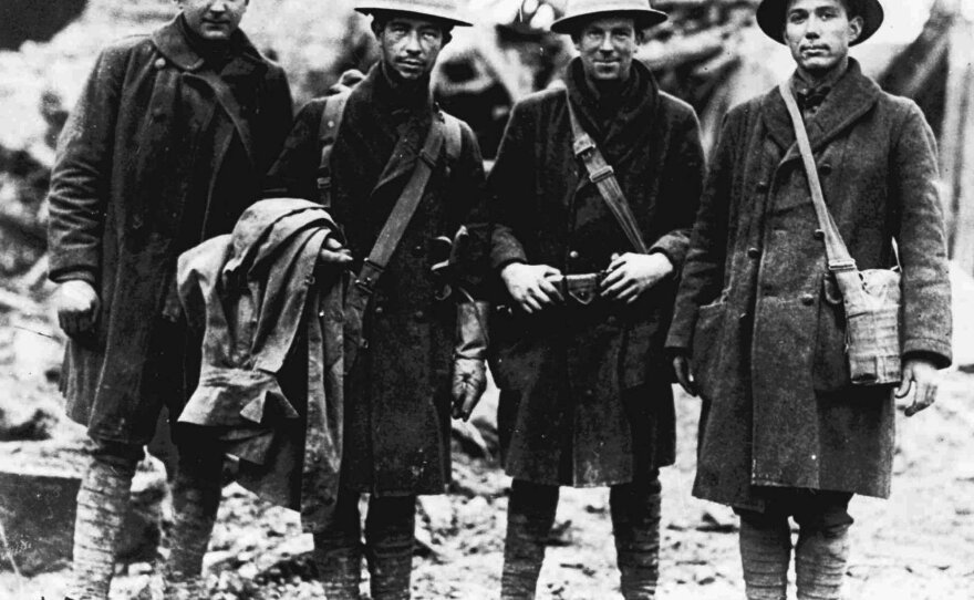 Four U.S. soldiers, runners for the 315th Infantry, pose in France in November 1918. The troops reportedly carried official orders to Lt. Col. Bunt near Etraye, France, shortly before noon, Nov. 11, 1918, announcing that the armistice had been signed, thereby ending World War I.