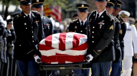 Military personal carry the casket of Sen. John McCain, R-Ariz., into the Capitol rotunda for a memorial service, Wednesday, Aug. 29, 2018, at the Capitol in Phoenix.