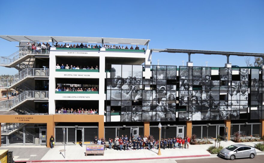 People who attended the dedication posed for a five-story group photo at San Diego Continuing Education's new Cesar Chavez car park in Barrio Logan. 